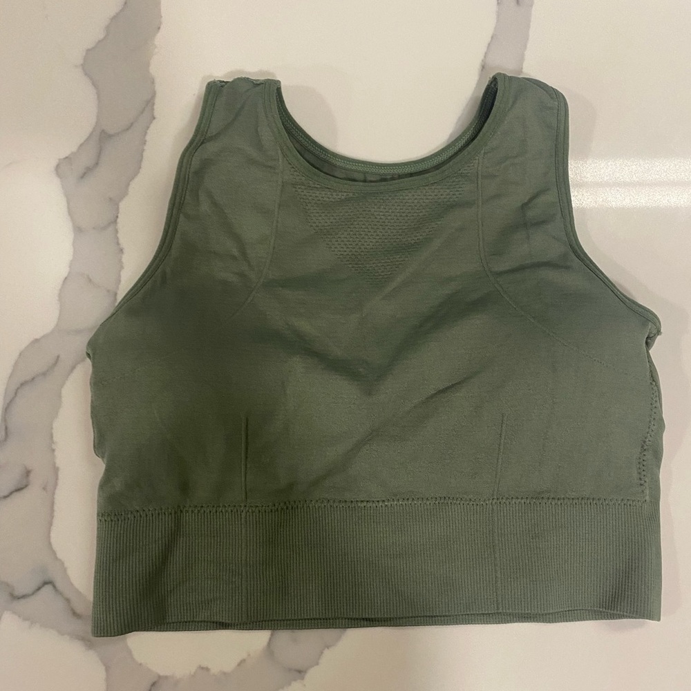 Amazon sports bra in olive green. Worn twice. Size M